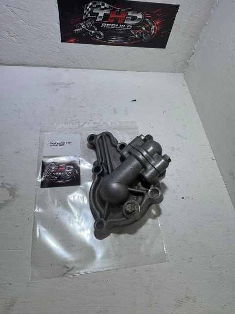 Carter pompe a eau OEM KAWASAKI 125 KX 1990 à 1993 référence 161421084 Occasion