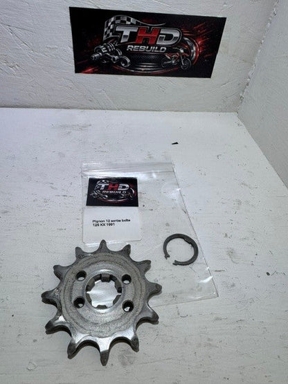 Pignon sortie de boite 12 dents OEM KAWASAKI 125 KX 1983 à 1993 référence 131441049 Occasion